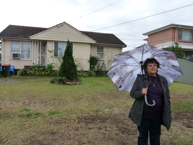 Auntie Janny Ely telling about looking out window for Welfare to inspect them